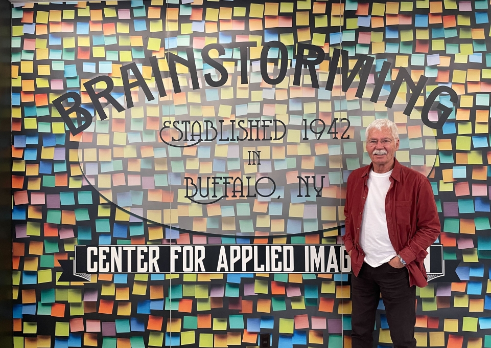 Tim Switalski in front of entrance to Brainstorming Room
